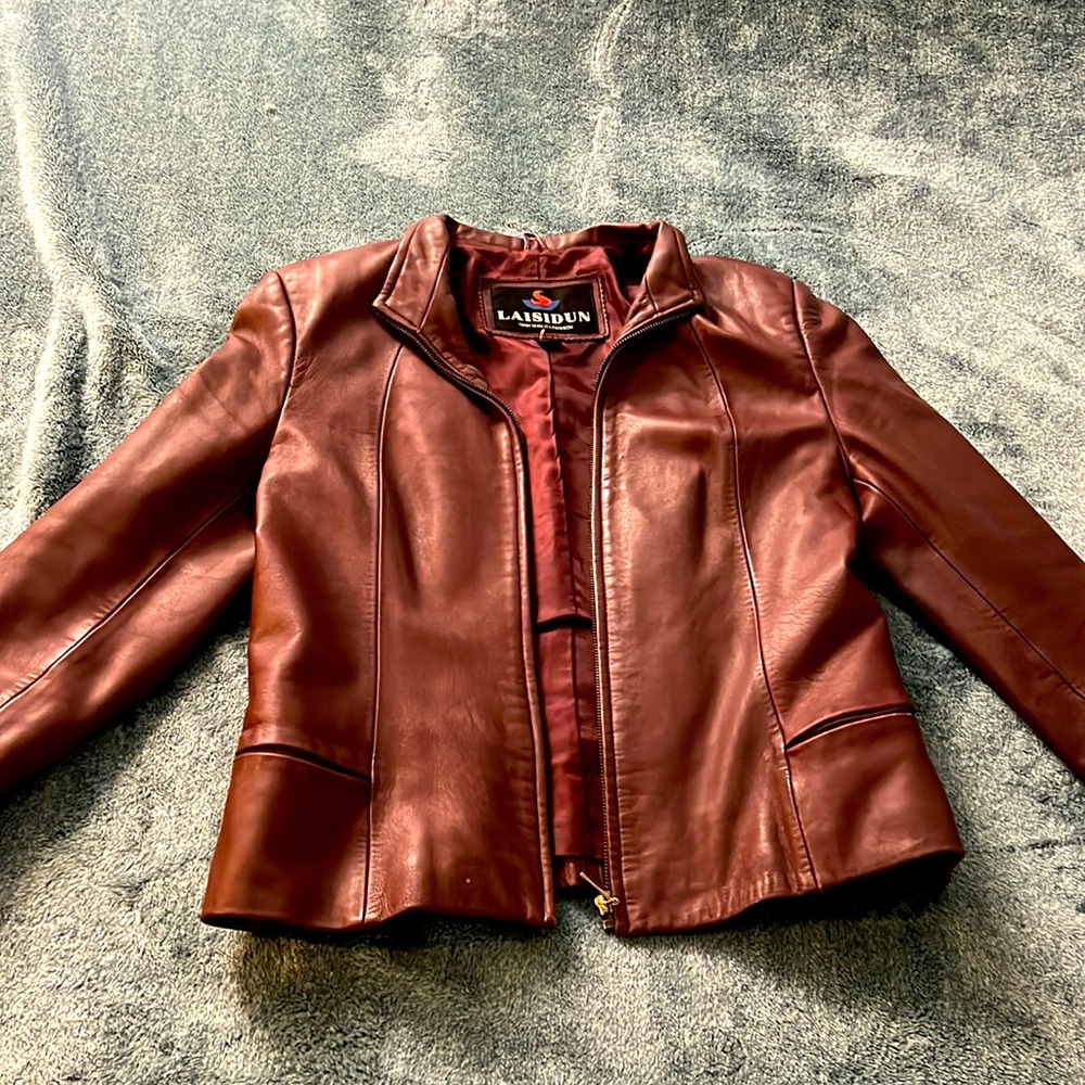 A gorgeous burgundy REAL LEATHER jacket!!!!